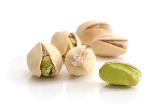 pistachios are less acidic and more alkaline and also have many health benefits.Its good for acid reflux.